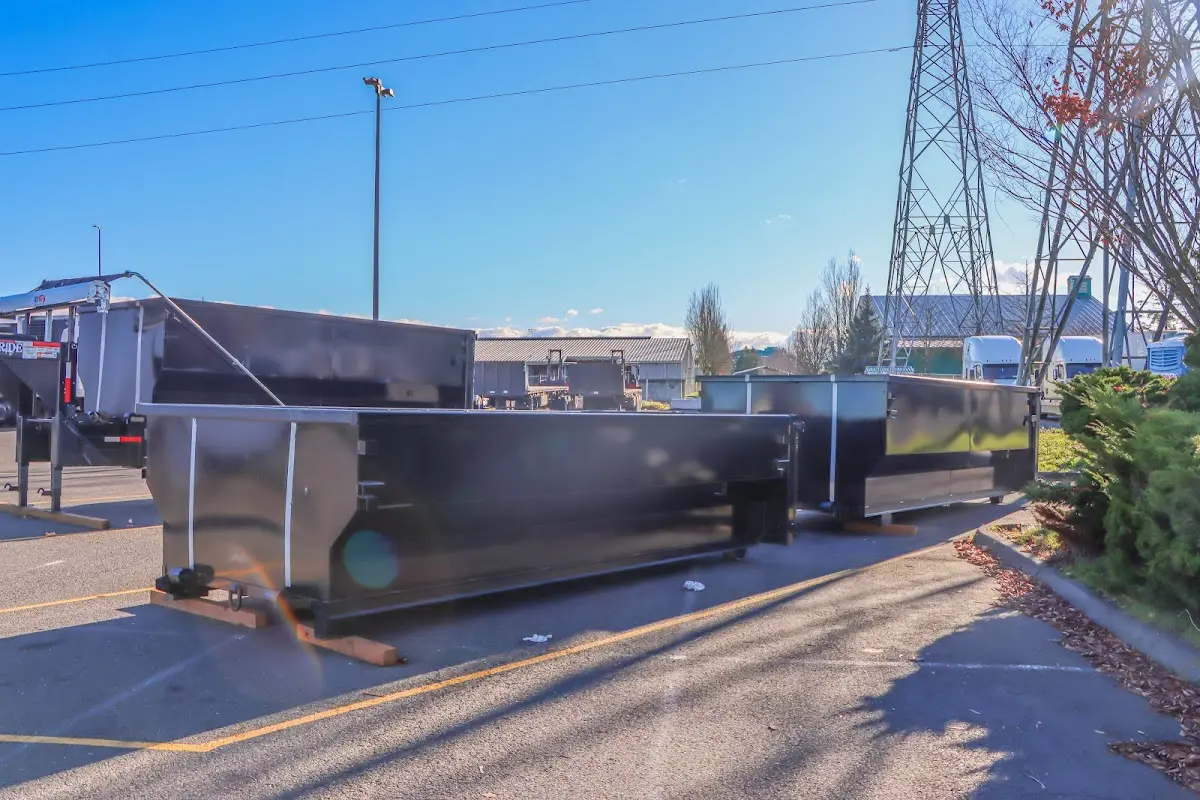 Roll-off dumpster ready for waste disposal at job site for 4 Yard Dumpster Rental in Hallsville